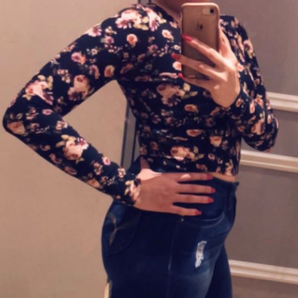 Black long sleeve crop top with floral print